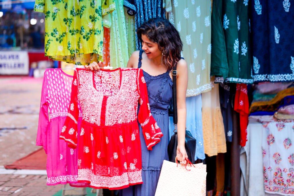 vecteezy_sexy-woman-shopping-red-colour-lakhnavi-top-in-outdoor-market_45642358